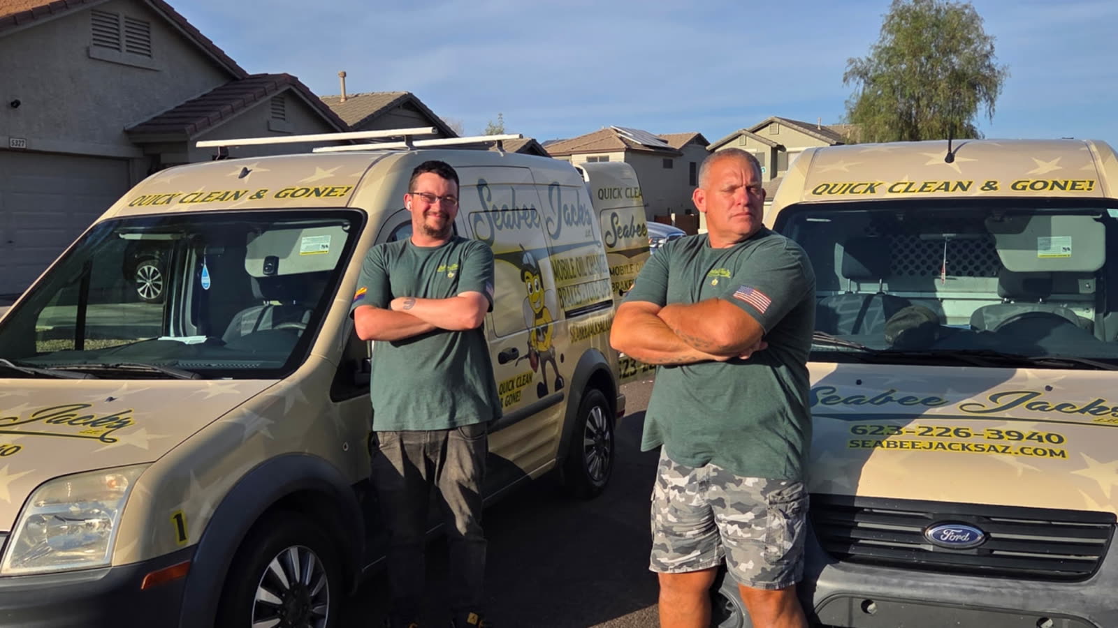 SeaBee Jack's family-operated, veteran-owned team in front of the service vans