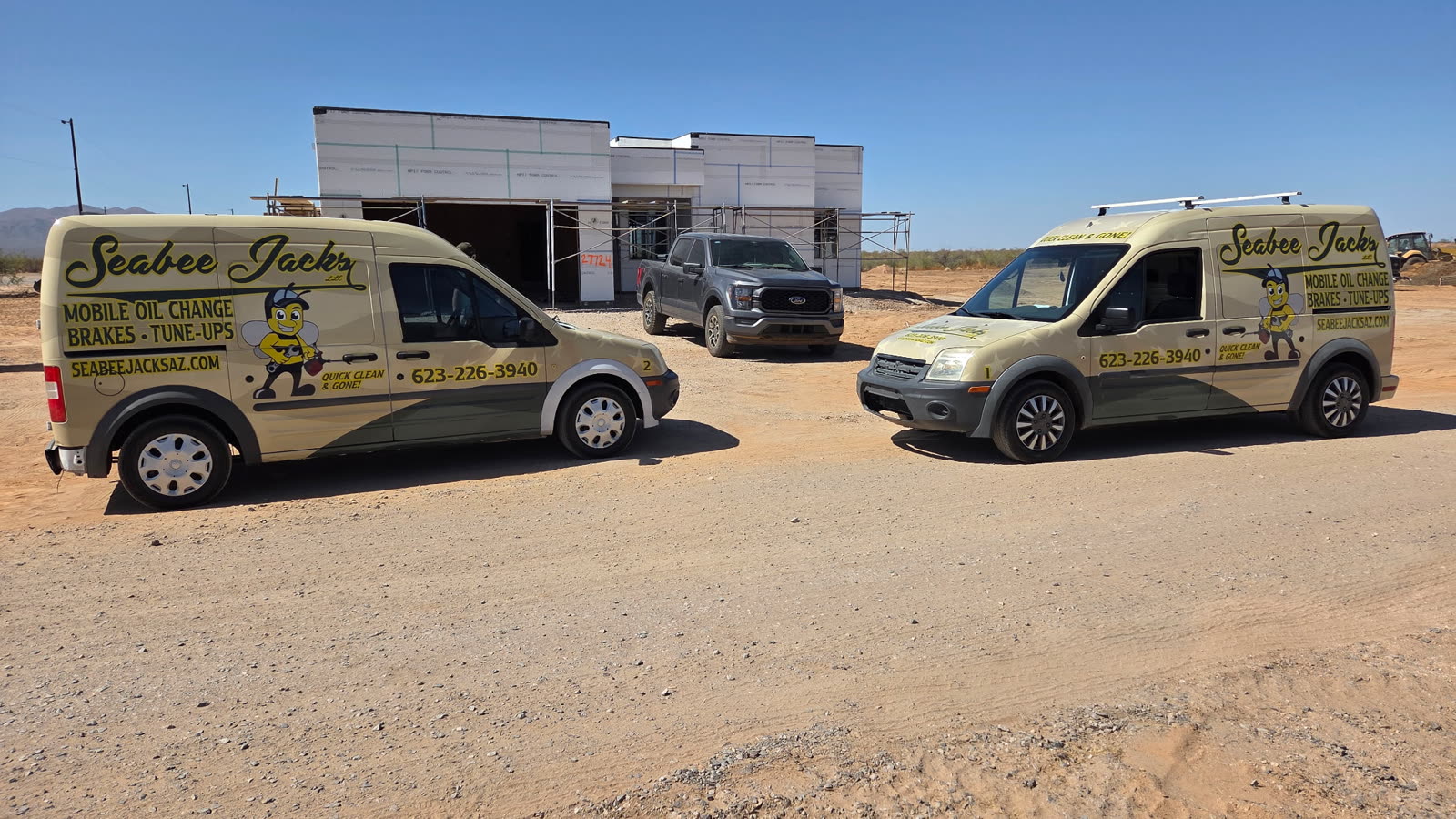 SeaBee Jack's branded service vans at a West Valley jobsite